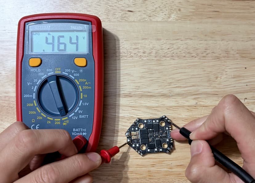 Low-side test on phase C. Multimeter reads 0.464 V — the outlier.
